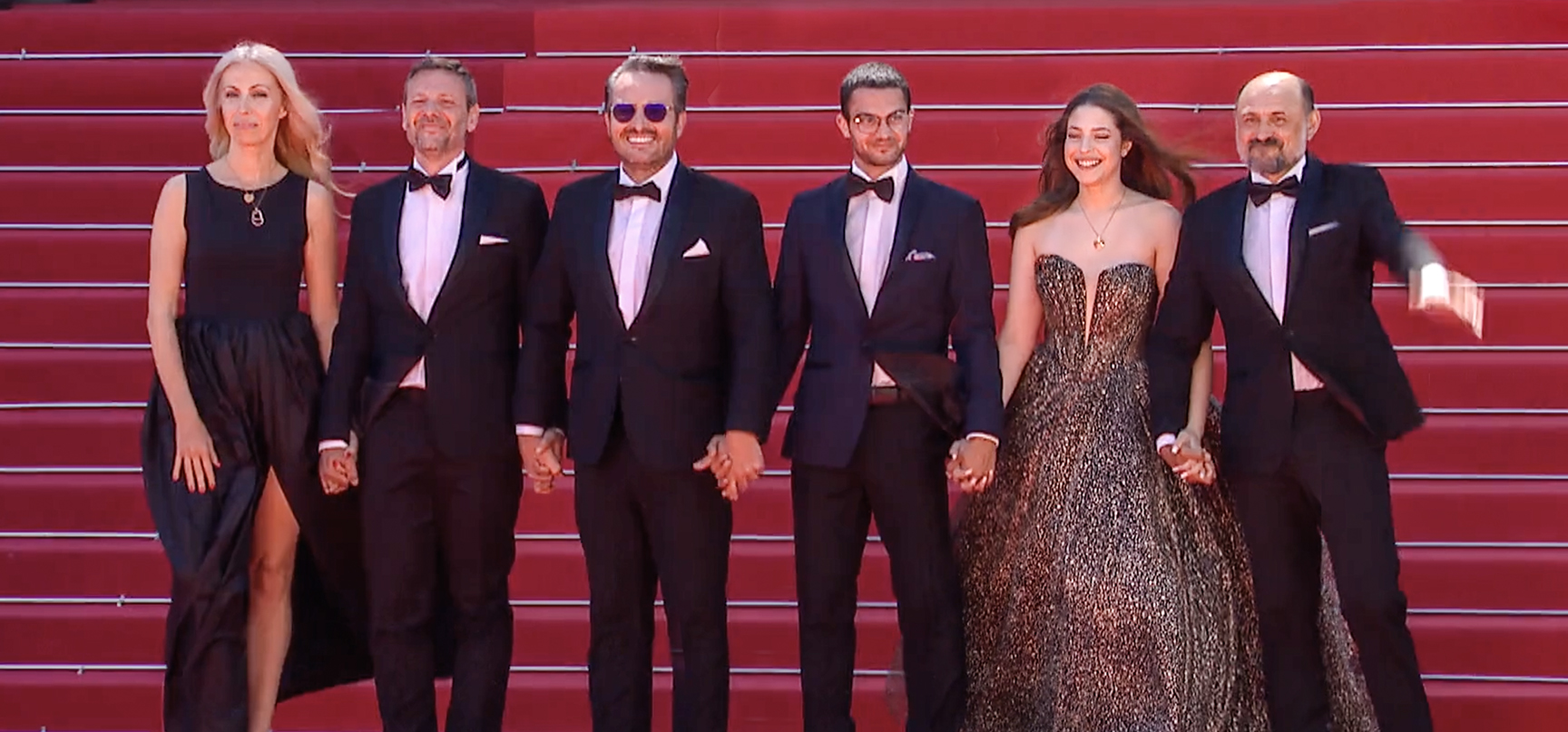 Emanuel Pârvu and the cast the cast of Trei Kilometrii Pan La Capital Lumia attending the premiere at Cannes Film Festival 2024