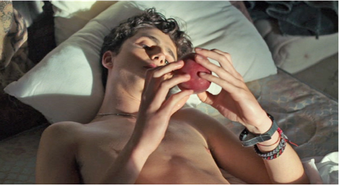 Elio touching a peach - extract from Call Me By Your Name by Luca Guadagnino - 2017.